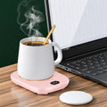 Pink smart mug warmer keeping coffee warm on a desk